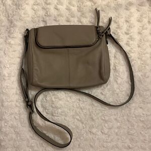 Vince Camuto NWOT leather cross body bag color is tranquility beige/gray